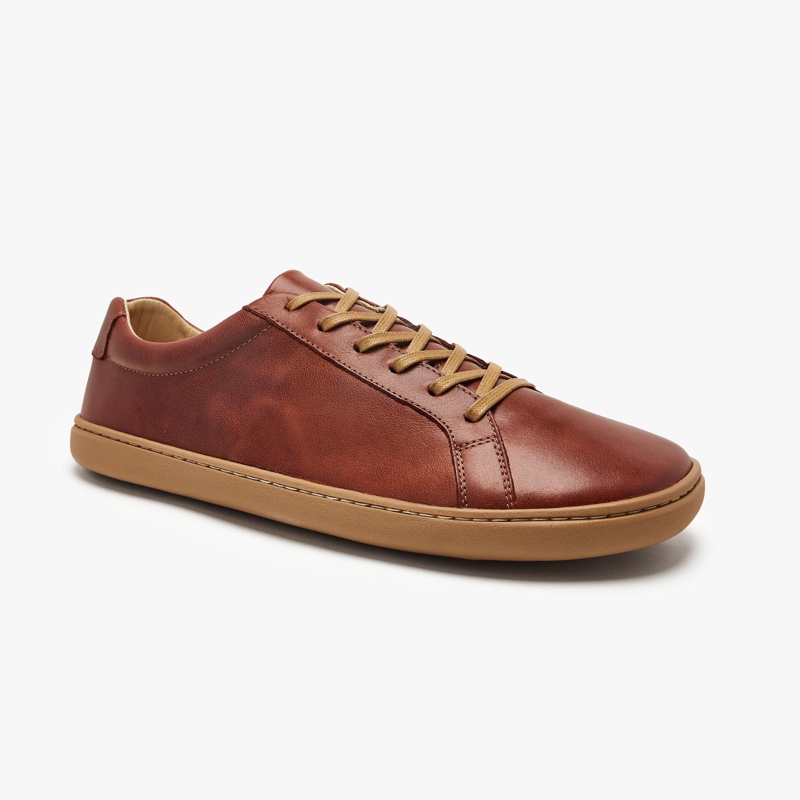 Cinnamon brown natural leather Men's Everyday Sneaker Gen 3 by Origo, angled side view with gum sole.